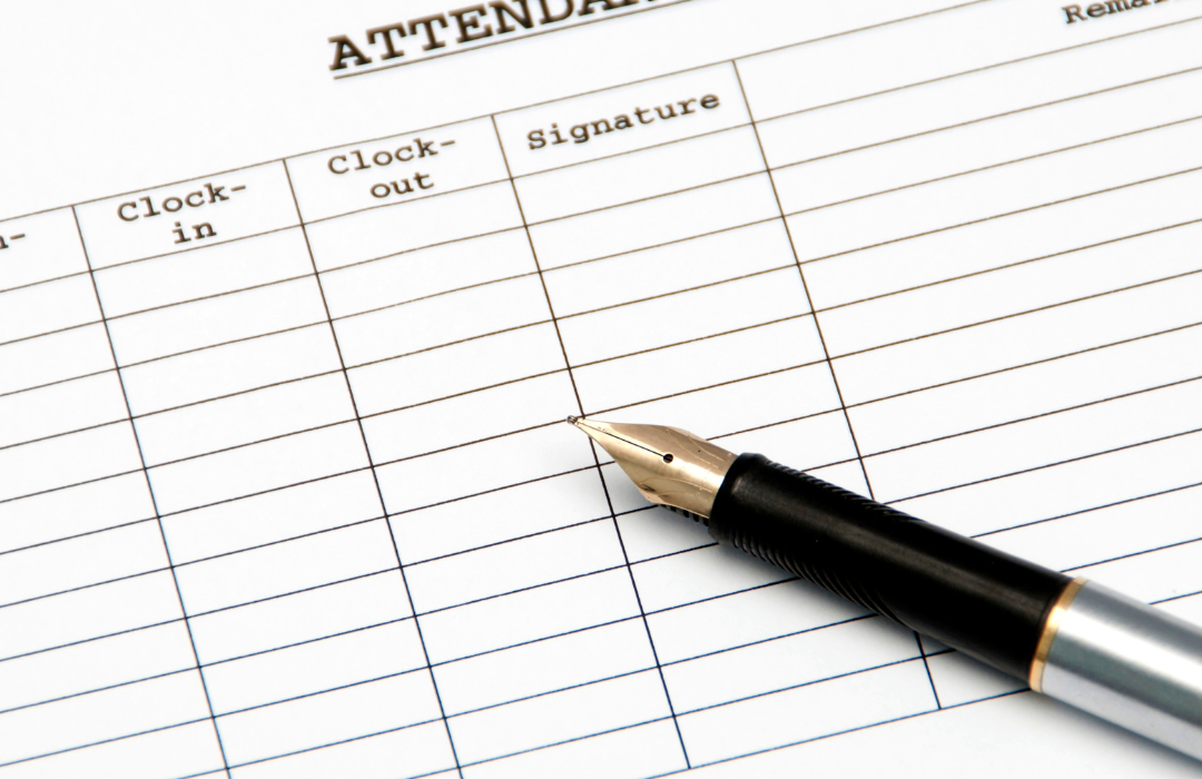 attendance "check-in" list representing traditional attendance system, with black pen